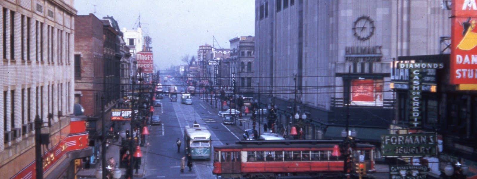 Trolleys crossing paths on 63rd St at Halsted St, 1952