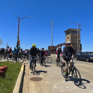 Dean Boyer leads bikers across the 95th Street bridge